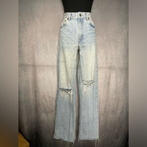 - Women's Light Blue Distressed Jeans